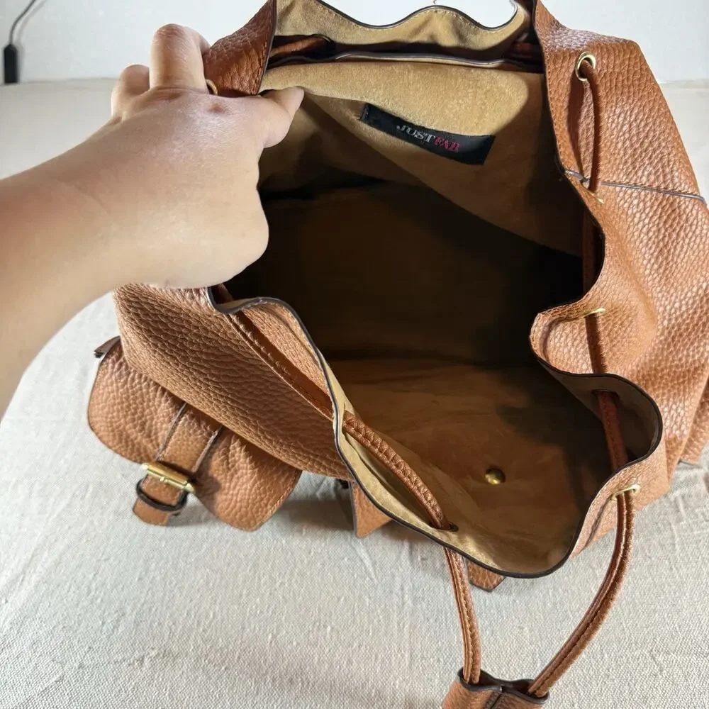 JustFab Brown Faux Leather Mini Backpack Purse Drawstring Flap Buckle Pockets